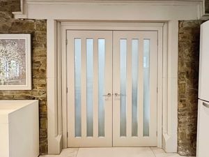 Doors from kitchen to lounge- click for photo gallery